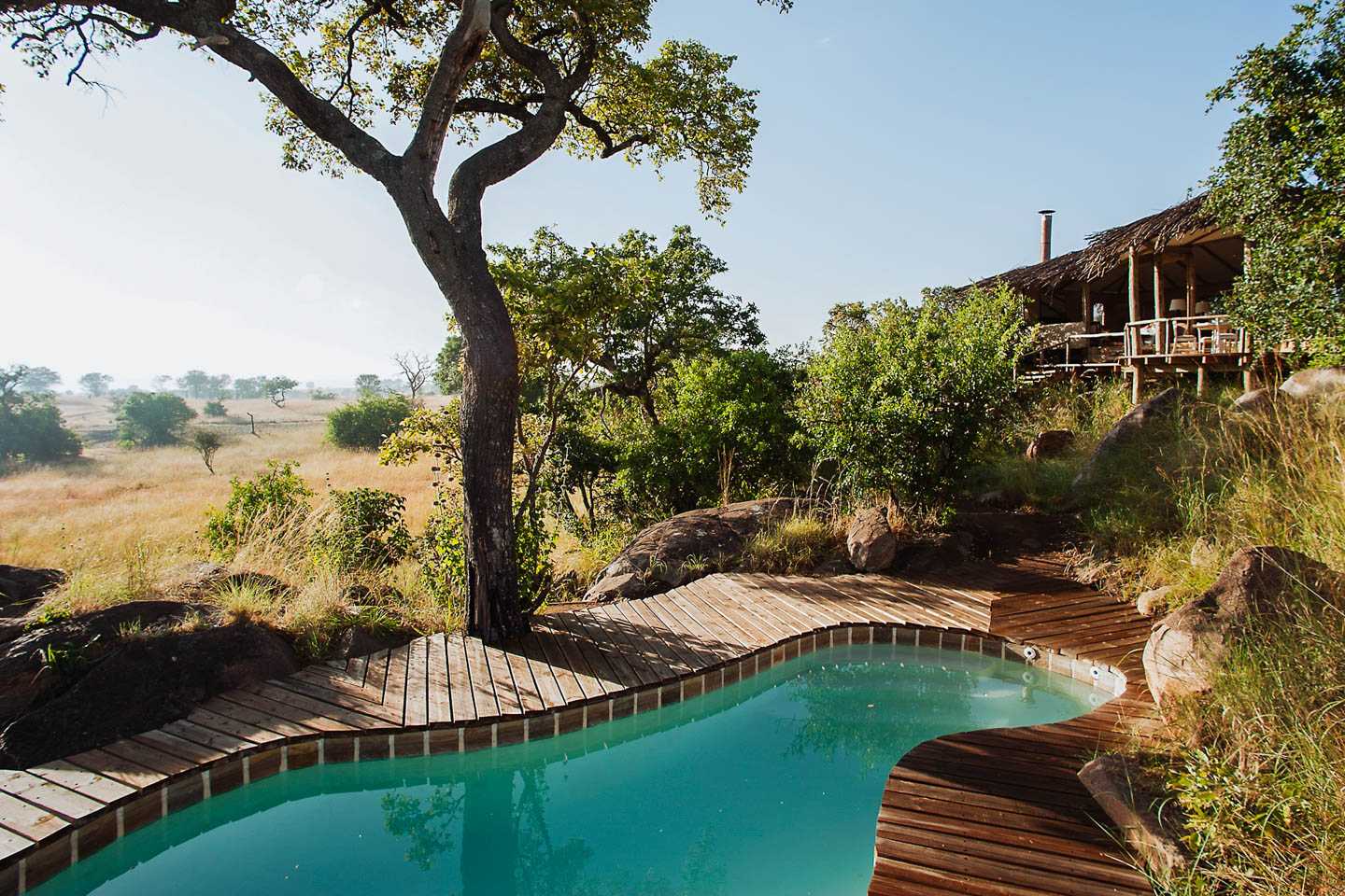 serengeti safari camps Great Wildebeest Migration namad lamai camp main pool area view of savannah