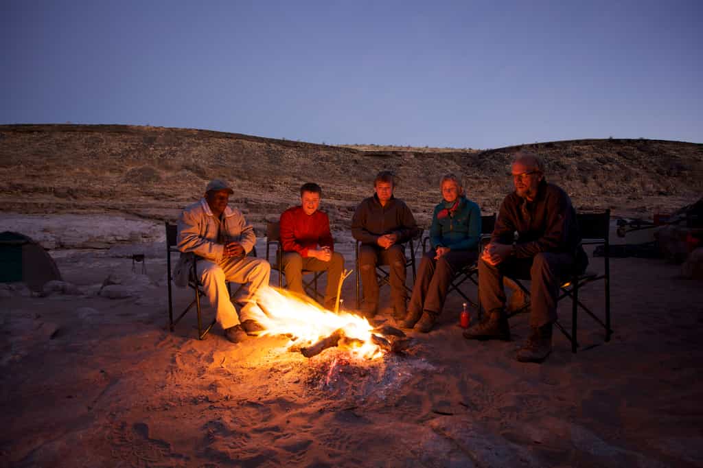 Around the fire in the evening on the hike 