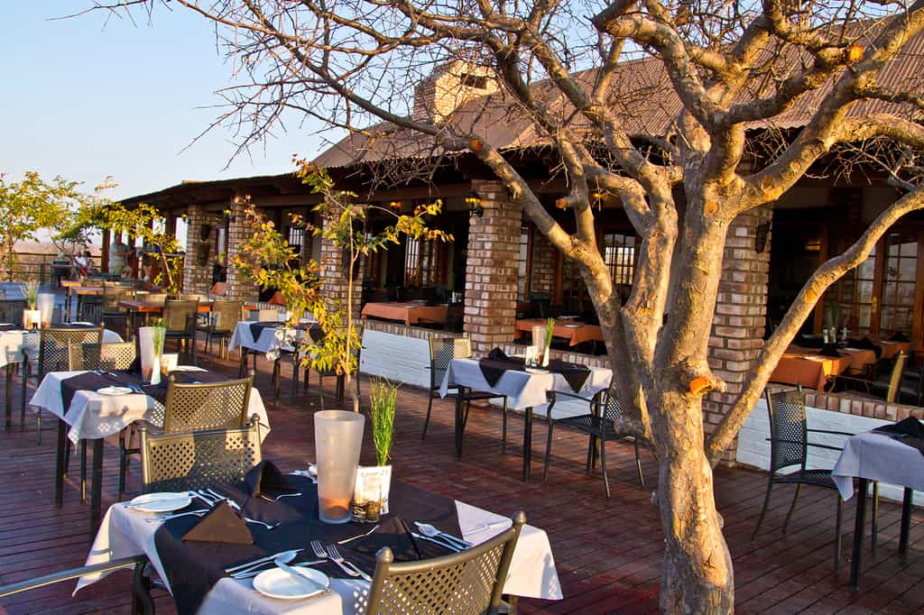The wooden platform for sundowners  is high above the Mopani bush and offers an amazing view of the landscape.