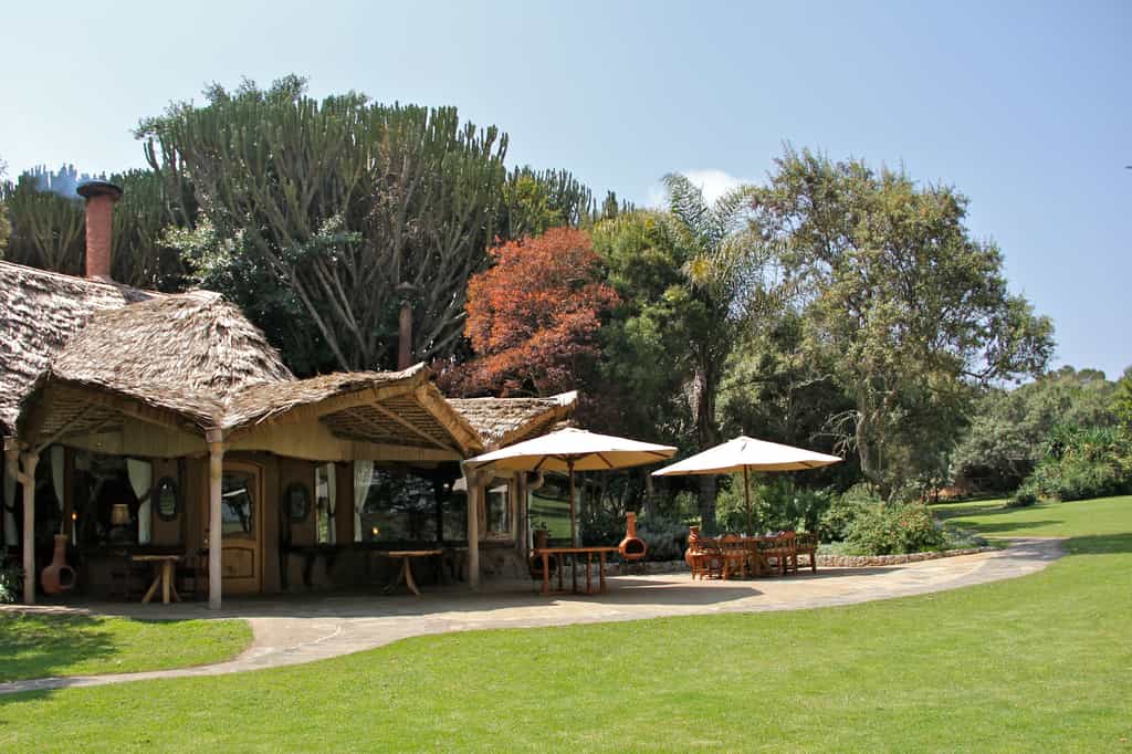 Overlooking the water pond, the lawn is a great outside dining area with a perfect view of the sanctuary