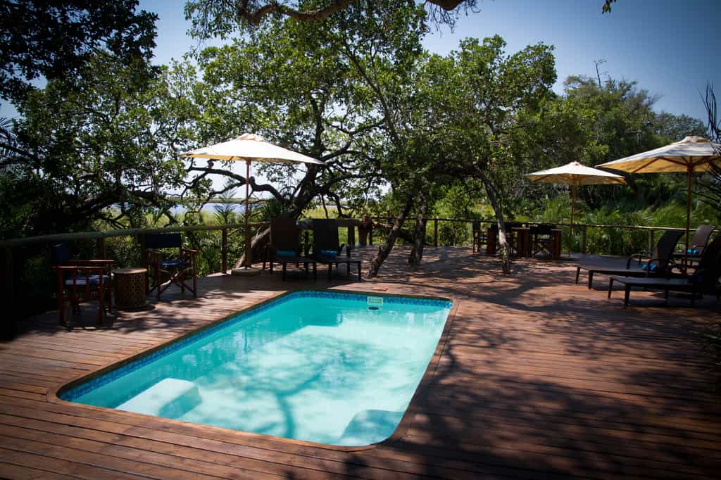 Relax around the pool between activities