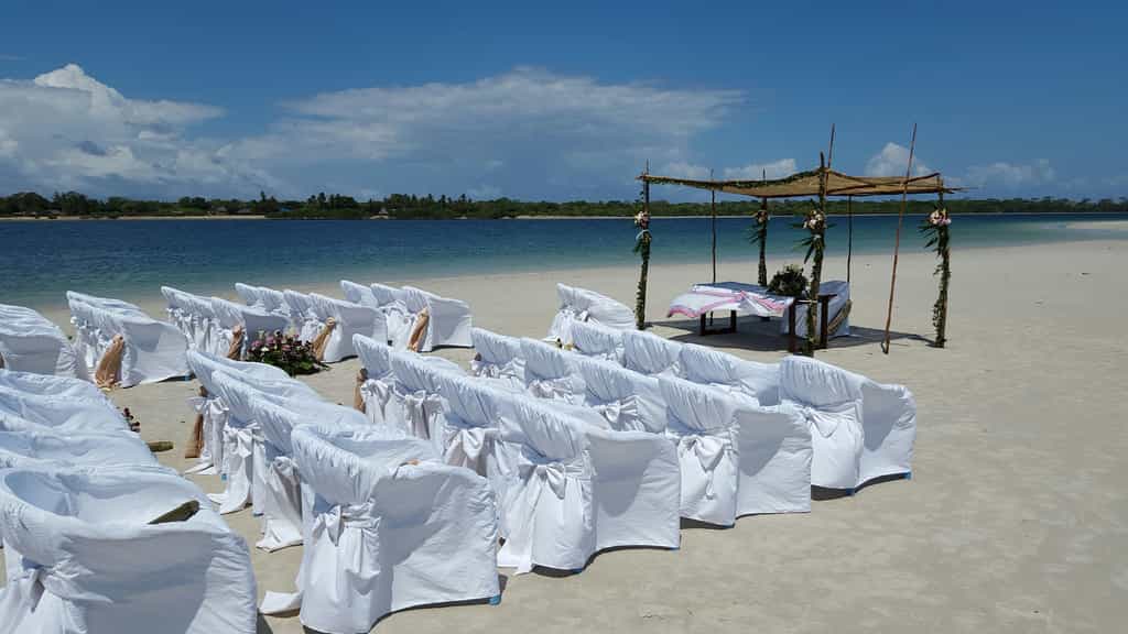 This shows the bridal arch set up on the sand bank - an idyllic location.