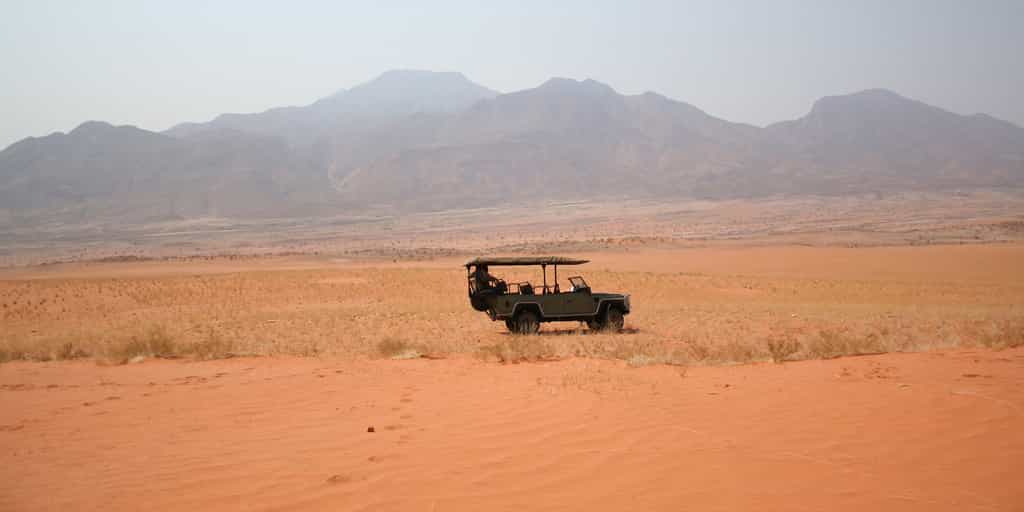Scenic drive into the mountains or golden sand dunes 