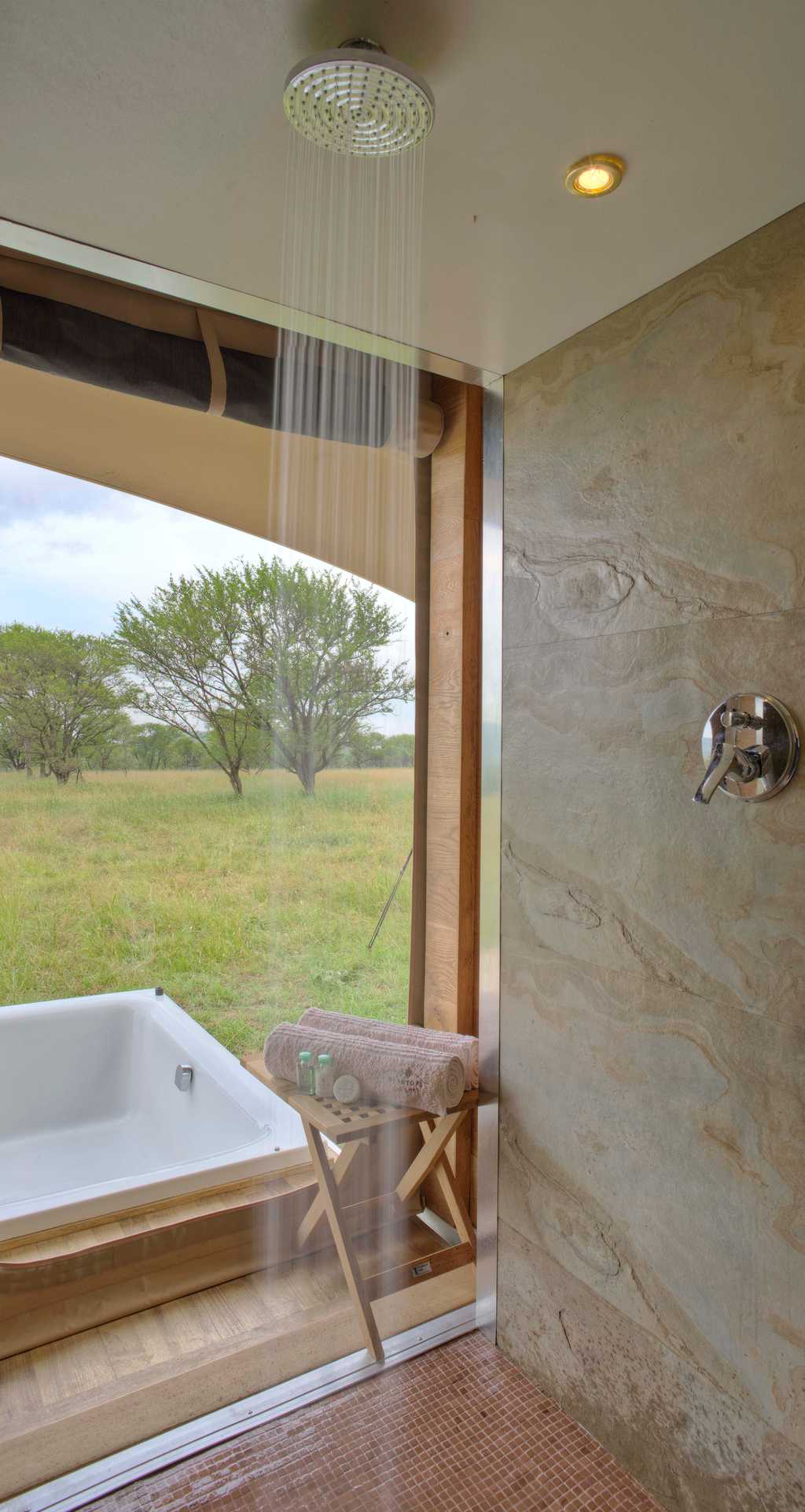 the shower area opens up to the Savannah and hot tub area