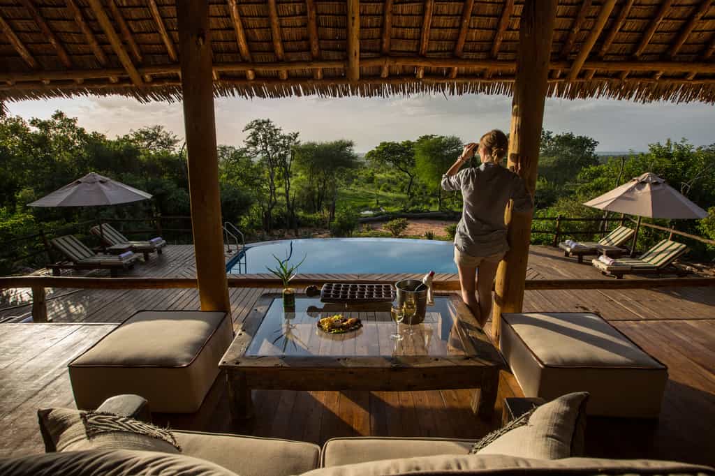 Lounge room overlooking the pool and waterhole