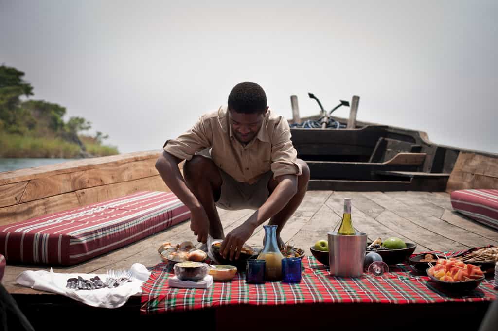 The journey is always part of the destination. After landing at the Mahale airstrip, you board the dhow for a gentle 90min cruise down the lakeshore, with a picnic spread and a glass of chilled wine in hand.