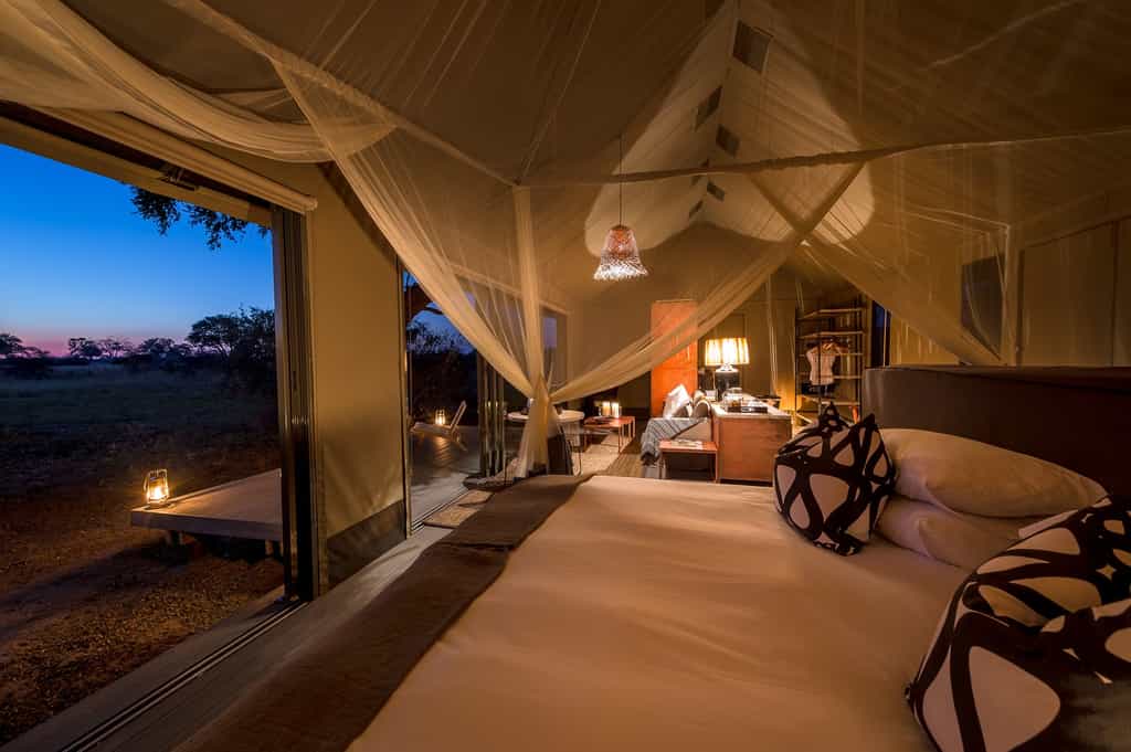 Tent bedroom with evening views