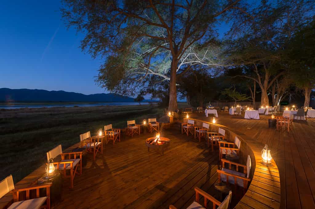 Enjoy an aperitif on the fire deck before dinner