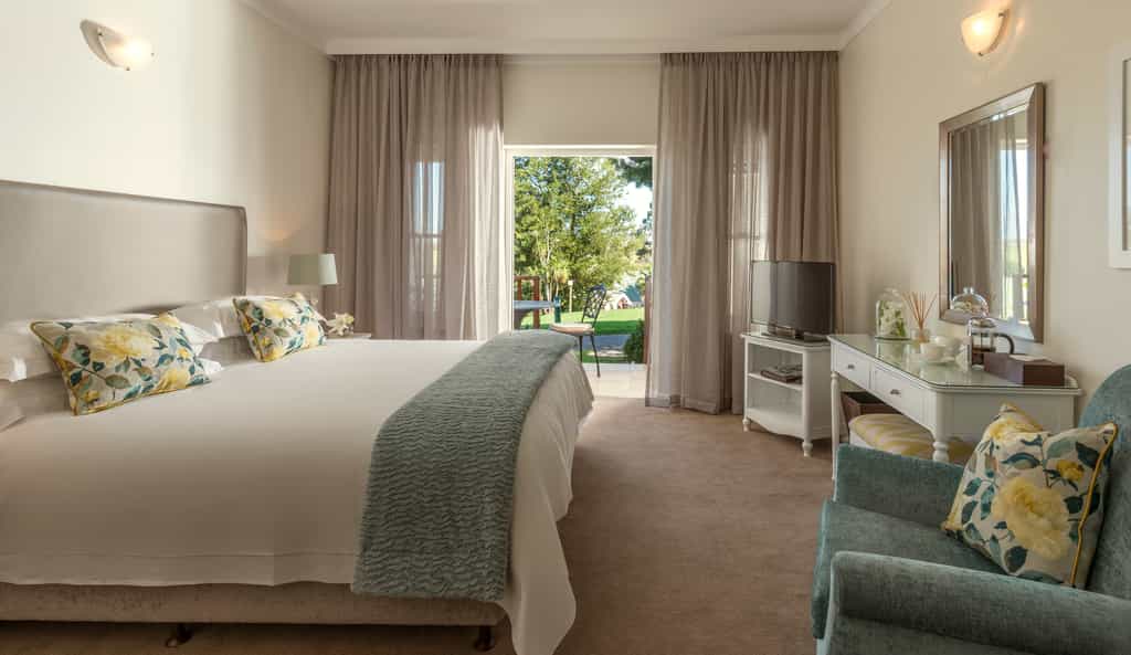 Overlooking the golf course or gardens in 300 Avenues Series.They have a separate lounge area and TVs in the bedroom and lounge