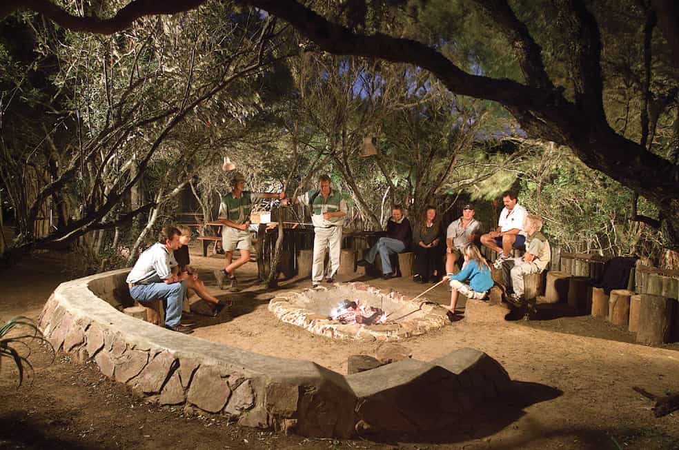 Enjoy traditional African cuisine by the light of lanterns and a warm fire. 