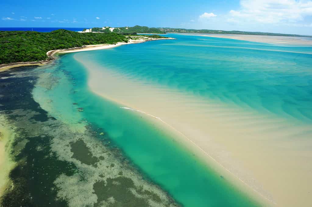 The lodge is in the background, the foreground shows the easy to access pristine snorkeling reefs