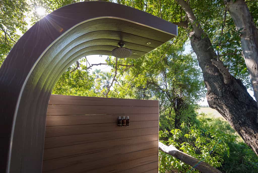 Private outdoor showers nestled amongst the trees