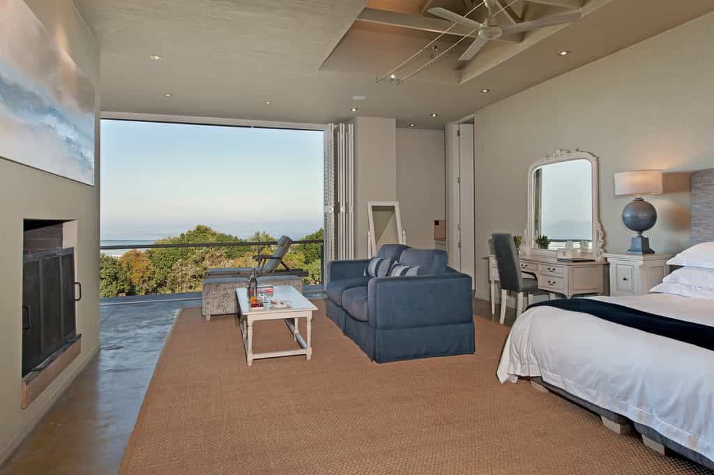 King bed, seating area and fire place in the Southern Right suite