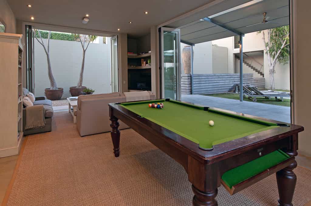TV, Board games, Pool table etc, downstairs opening into the quart yard area