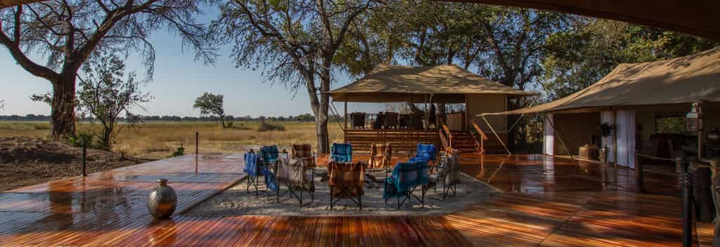 Meru-style tents form the common area and open onto a central deck and fire pit.