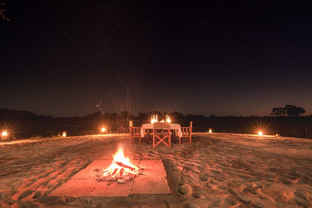 Starlit supper at the fire