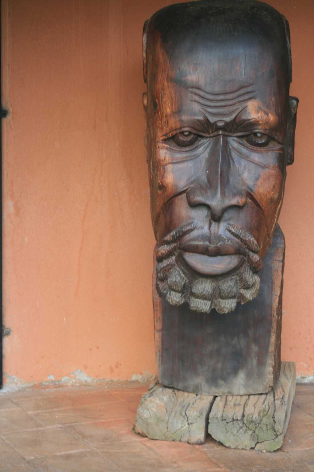 One of the beautiful hand carved wooden esculptures in our Garden.