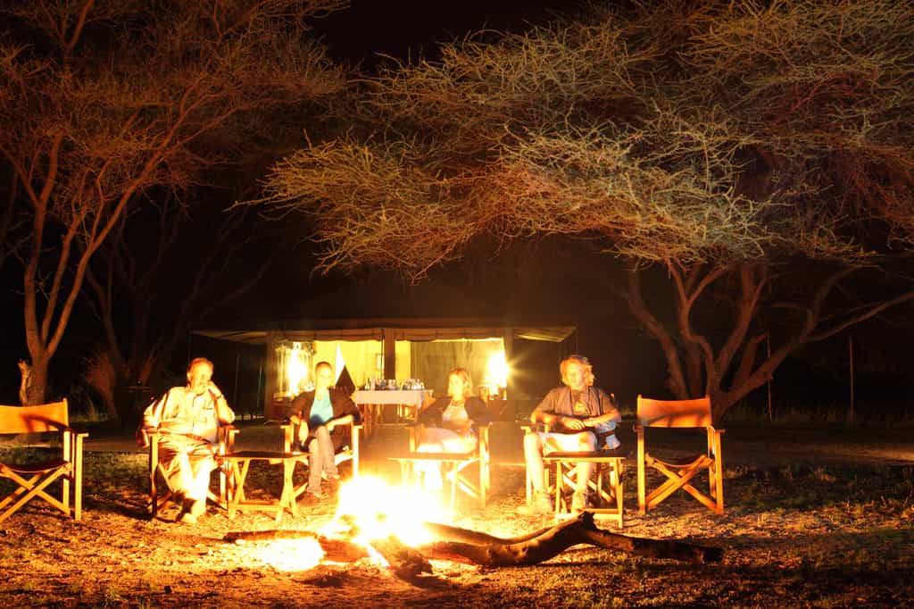 Drinks and Canapé's are served by the camp fire