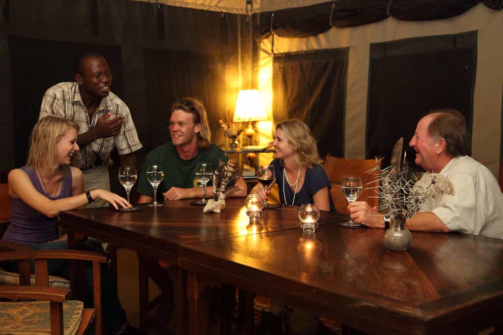 Enjoying a Drink in the Camp Mess after Dinner