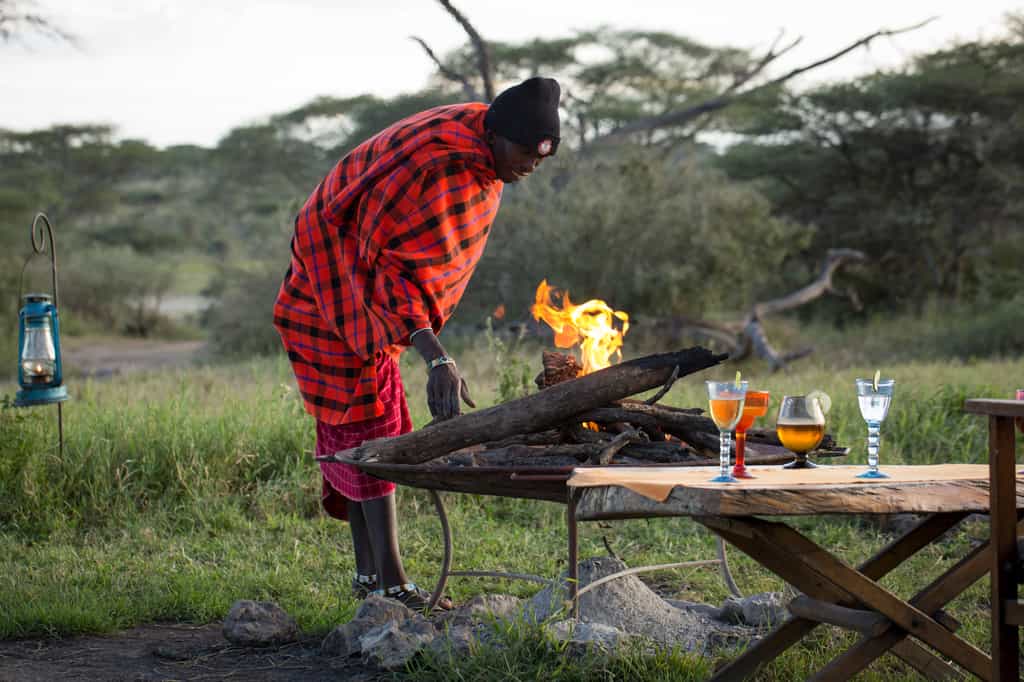 Sitting around the camp fire, listening to the sounds of the African wilderness