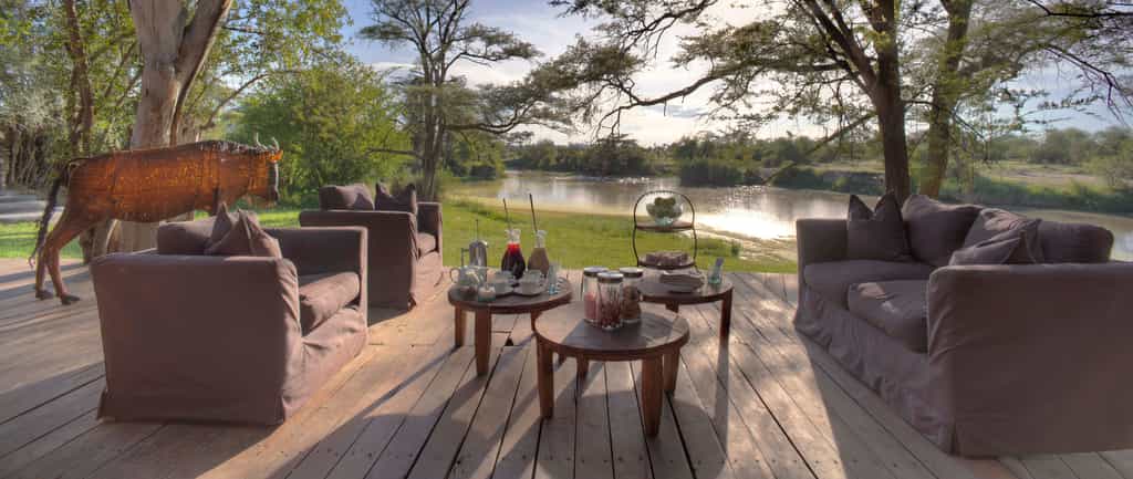 Guest areas boast views of the river and its resident hippo
