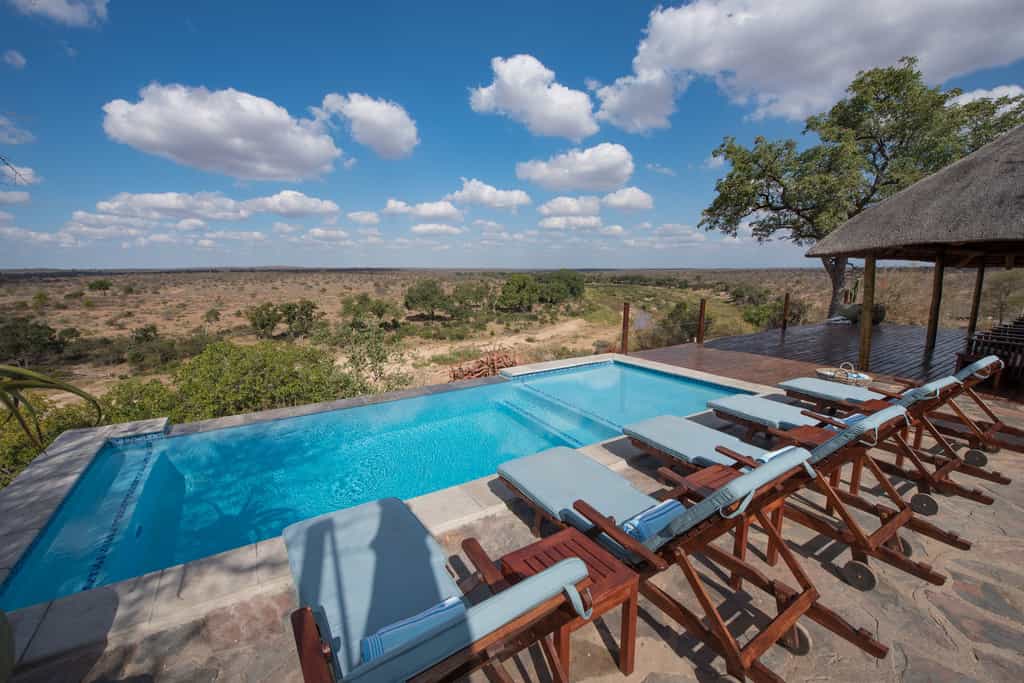 Rim flow pool and deck area overlooking the Klaserie River