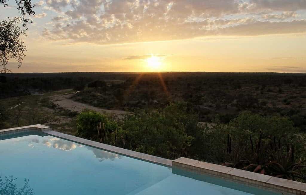 Watch an amazing sunset over the Klaserie from the cool comfort of the rim flow swimming pool