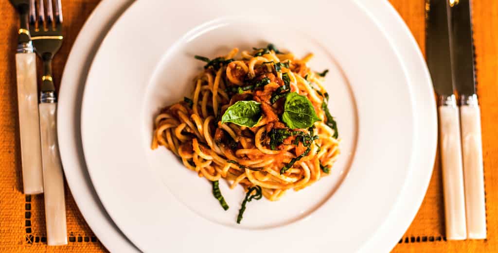 Homemade pasta tomato and basil 