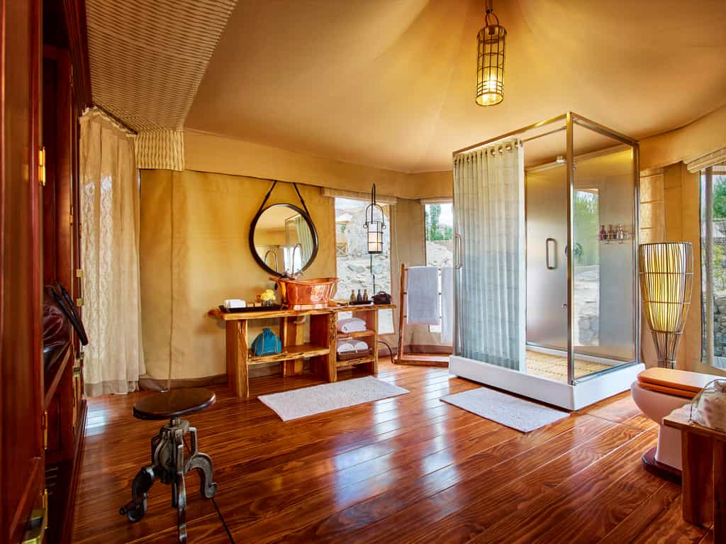 En-suite bathroom, Shower cubicle, Round-the-clock hot and cold water, Hair dryer and shaver socket, Custom-made bedroom slippers, eye masks, and earplugs, Custom-made bath accessories