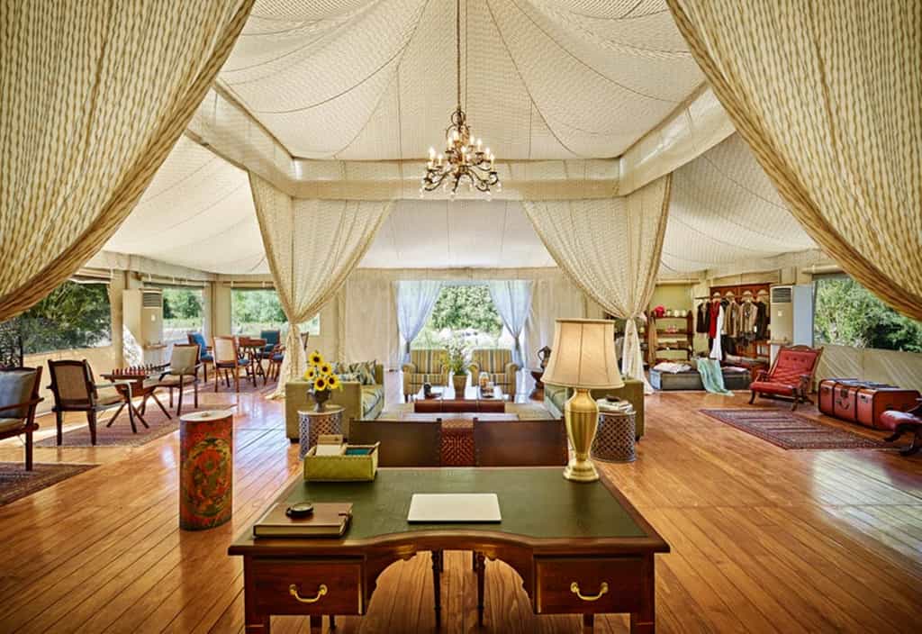 A reception tent is present across all our campsites, Our lobby is the perfect place to meet fellow guests to share tales and experiences, Guest Relations Executive to look after your wants and needs, In-House Tour Manager to prepare the every-day itinerary of our in-house guests as per their interests, Boutique to shop for amazing local handicrafts, Wi-Fi zone, Doc station for iPods, Board games for the family, In-house library