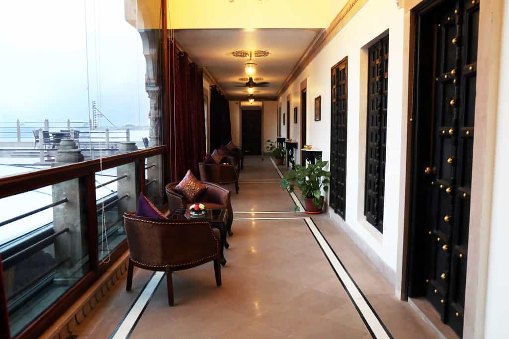 Dhanurdhara Rooms corridor with adjoining terrace