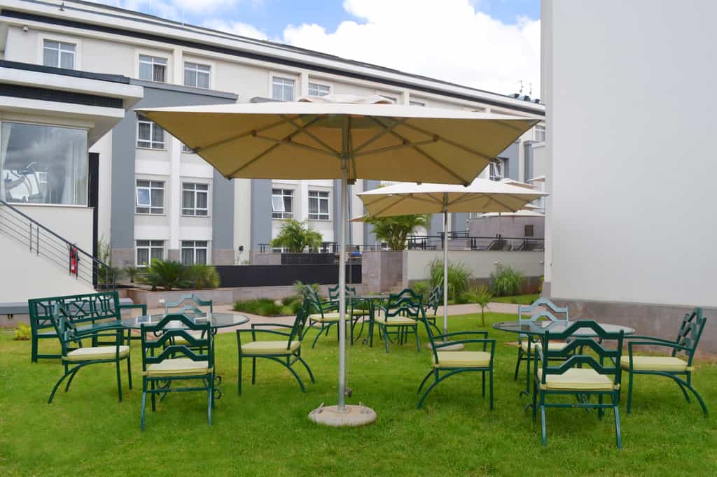 Lush gardens located next to the swimming pool