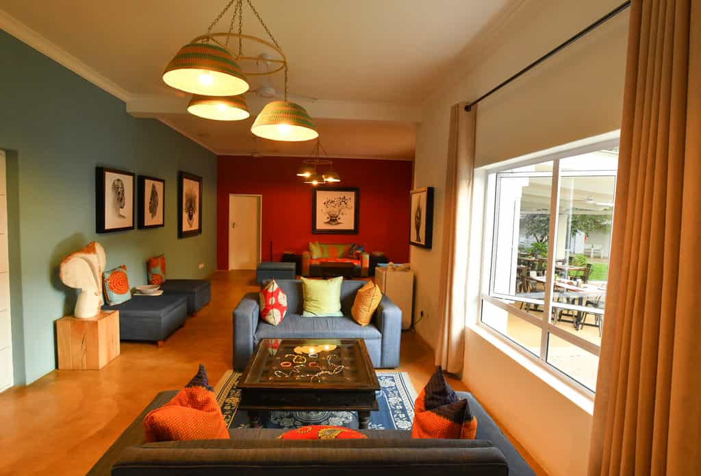 The bright and colourful lounge is the perfect place to relax after a long day of exploring Victoria Falls.