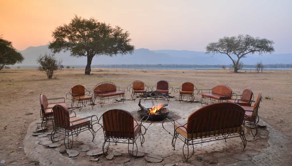 Enjoy the evening around the conversation pit under an African sky