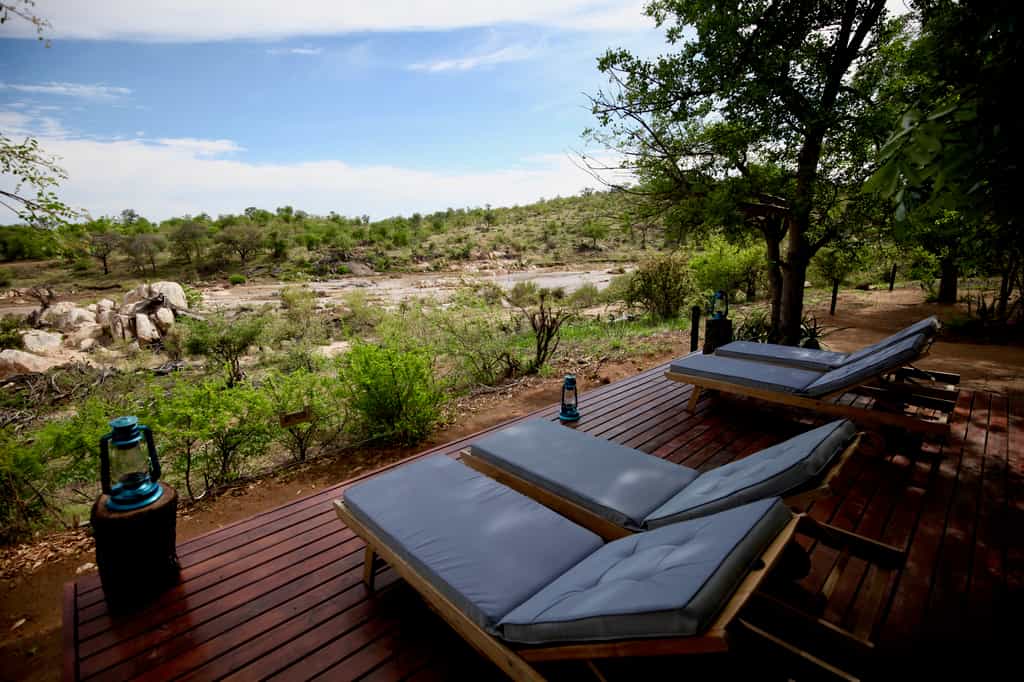 Deck loungers to relax and enjoy the sights and sound of the river