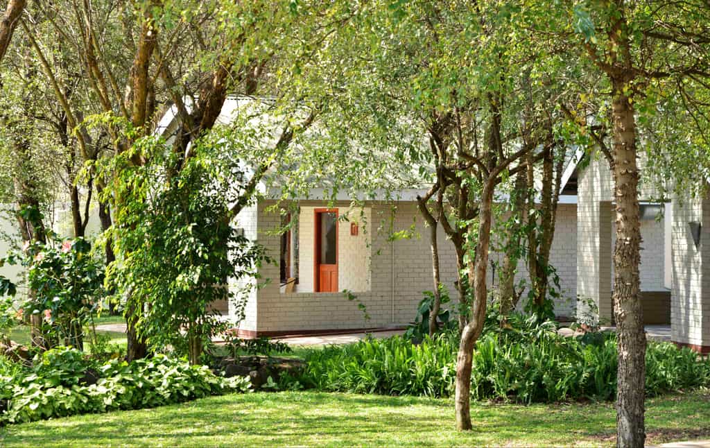 Freestanding chalets nestled amongst beautifully manicured gardens.