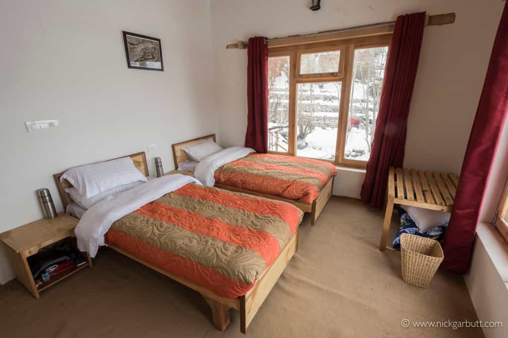 Twin bedrooms with shared bathroom