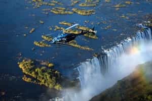 Take a helicopter flight over Victoria Falls