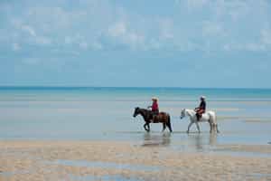 Take a horse ride on Benguerra Island's beaches