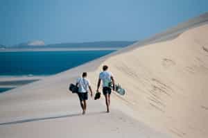 Soar down the dunes on a sand board in Bazaruto