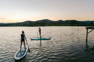 Paddleboard on the scenic lagoon of Piuray