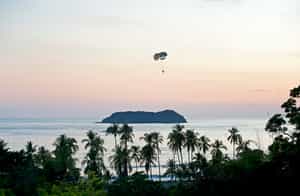 Parasail above the pacific ocean in Manuel Antonio