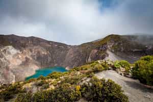 Visit the dazzling blue Irazu Volcano crater