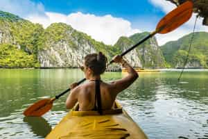 Explore the Halong Bay islands in a kayak