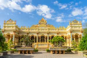 Explore the grounds of the Vinh Trang Pagoda