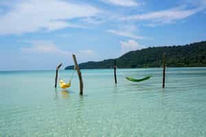 Hangout in a hammock over the water in Koh Rong