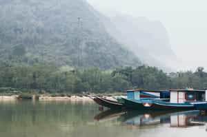Take a boat out along the Nam Ou River, Nong Khiaw