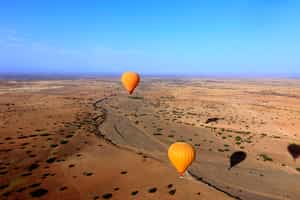 Drift over the desert near Marrakesh in a balloon