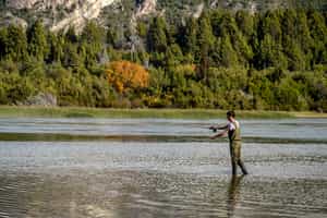 Go fly fishing in the fjords of Puerto Natales