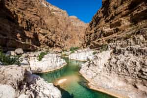 Go canyoning at Hawer Falls in Wadi Hawir